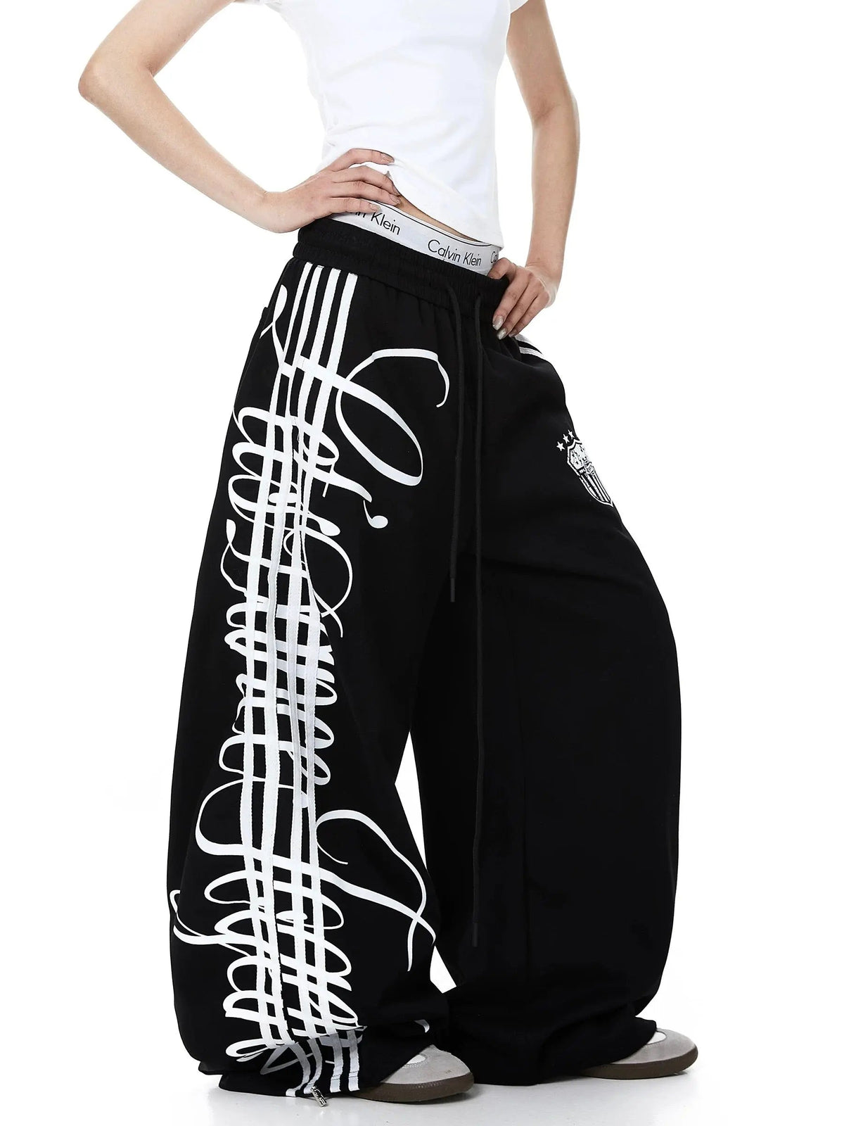 Pantalon de jogging baggy à bandes et motif graphique – vue 8